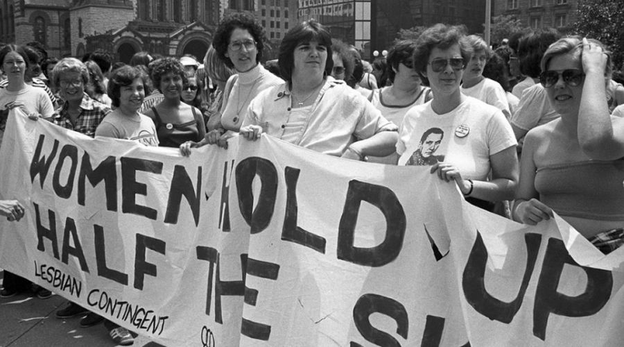 The lesbian contingent at the Back Bay gay pride parade display a banner quoting Mao Zedong: "Women hold up half the sky." Photo Credit Spencer Grant, Spencer Grant Collection at Boston Public Library