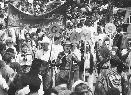 Gay Pride marches down Beacon Street in Boston. Credit: Boston Globe Staff, Wendu Maeda