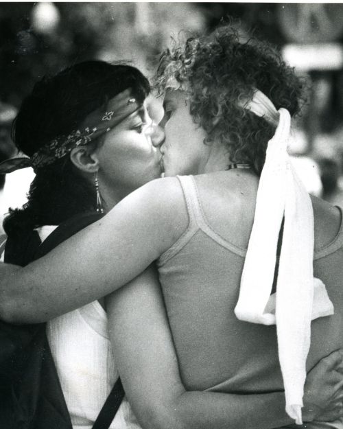 Two women kiss during Boston Gay Pride Parade down Boylston Street Credit: Boston Globe