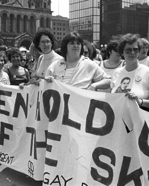 The lesbian contingent at the Back Bay gay pride parade display a banner quoting Mao Zedong: "Women hold up half the sky." Photo Credit Spencer Grant, Spencer Grant Collection at Boston Public Library
