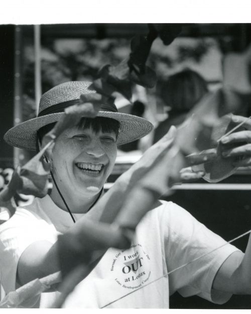 Polly Laurelchild-Hertig helps put the first corporate float together, she works for Lotus, to take part in the 24th Annual Pride Parade. Credit: Michele McDonald/Boston Globe Staff