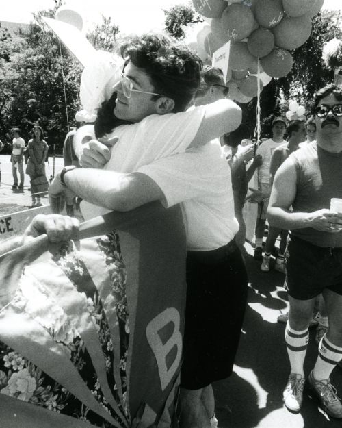 Marchers embrace as the Gay Pride march enters the Boston Common. Credit: Suzanne Kreiter/Boston Globe Staff